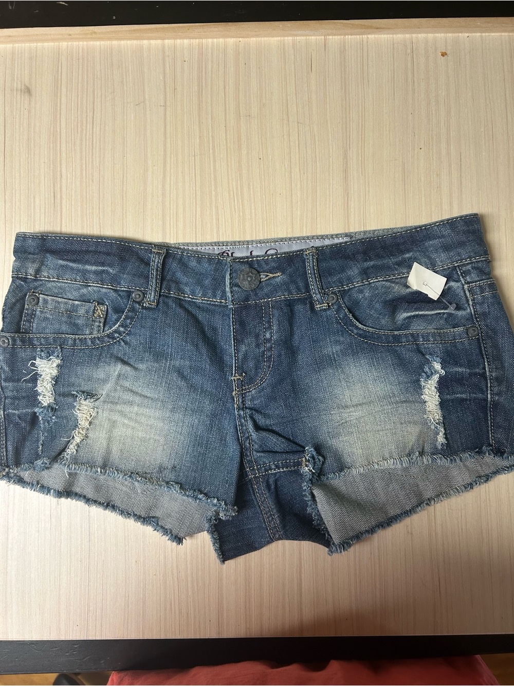 Distressed Light Blue Denim Cutoff Shorts